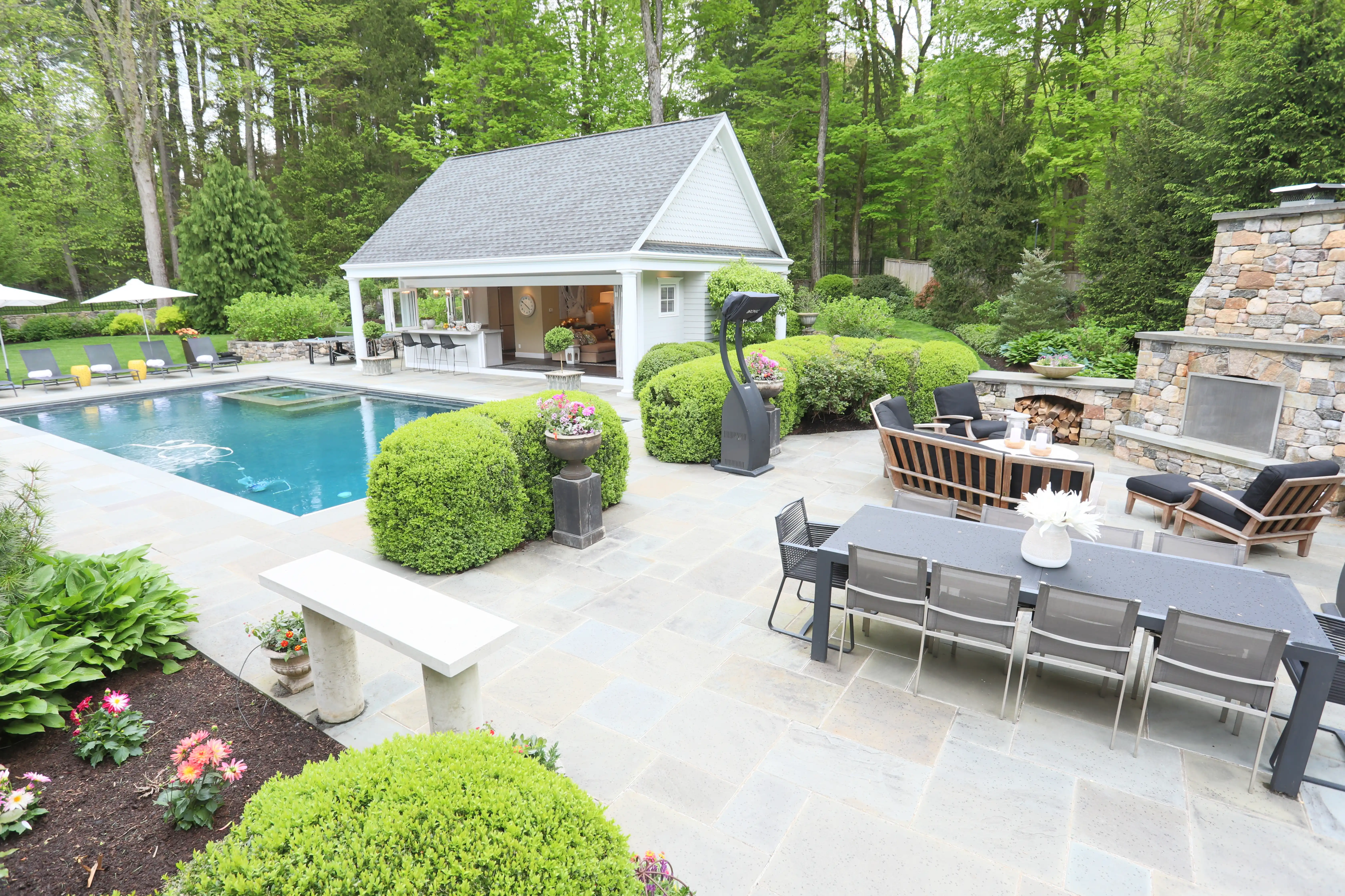 Outdoor kitchen with stone patio in Fairfield County